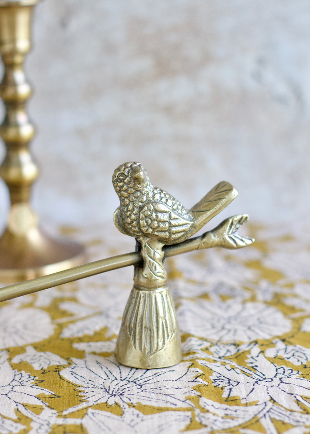 Kerzenlöscher aus Messing mit Vogelmotiv