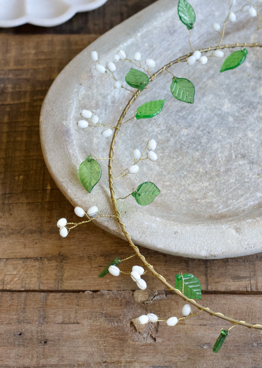 Wreath green leaves and white beads