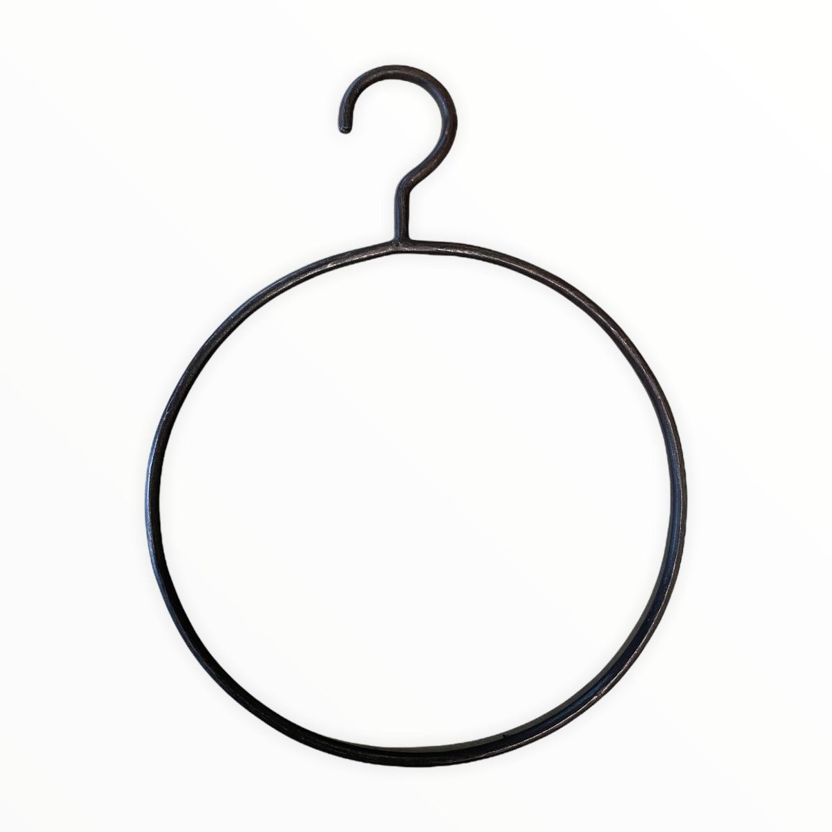 Metal circle hanger on a white background