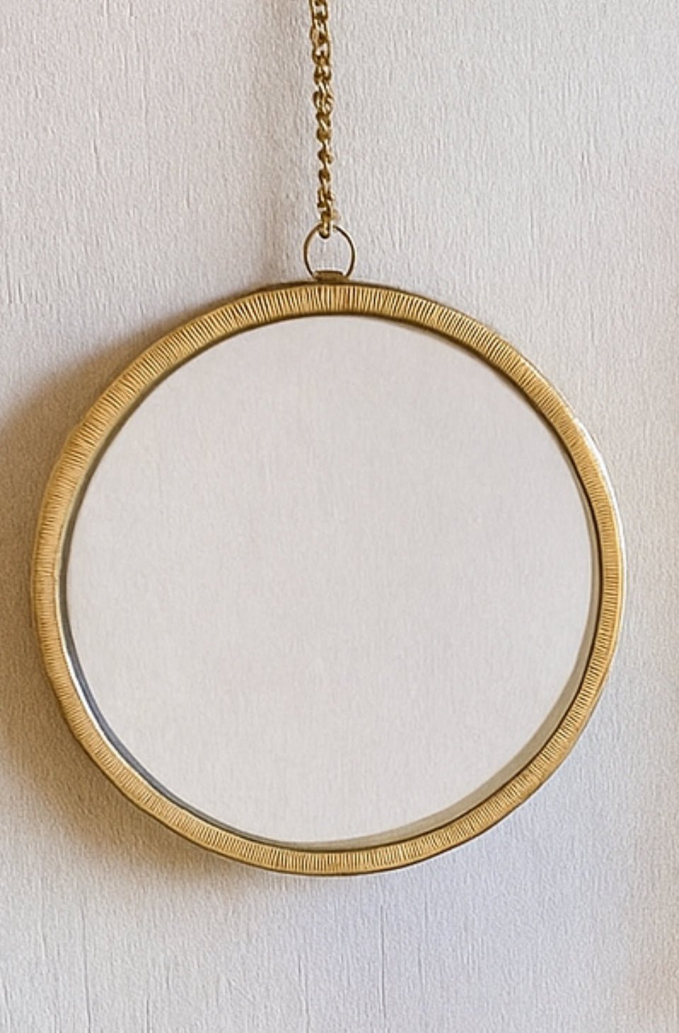 Petit miroir mural rond