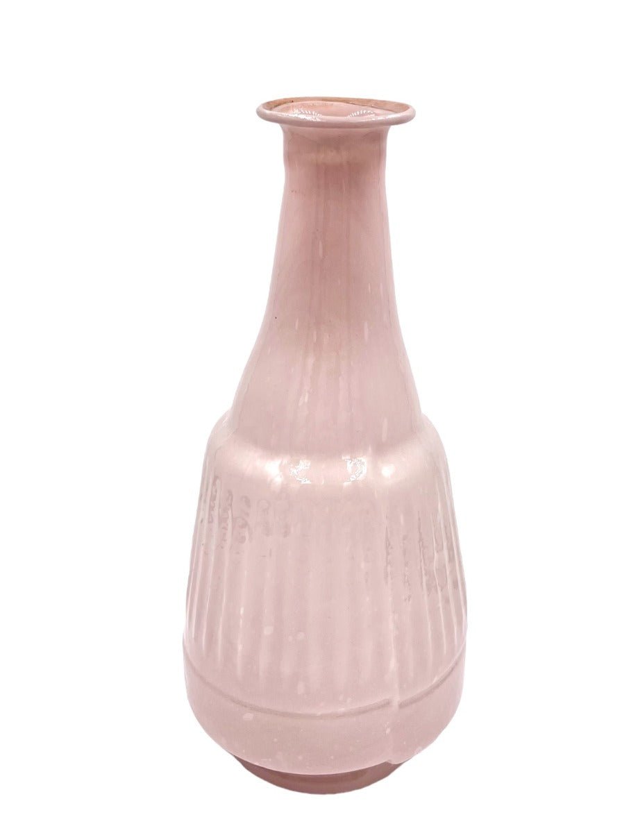 Tall opaline glass vase in dusty pink with a fluted base and wide rim, set against a white background.