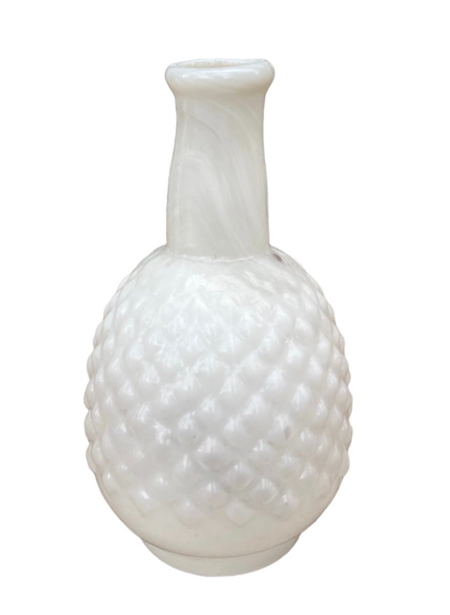 Small white opaline glass vase with a diamond-patterned texture and narrow neck, shown on a white background.