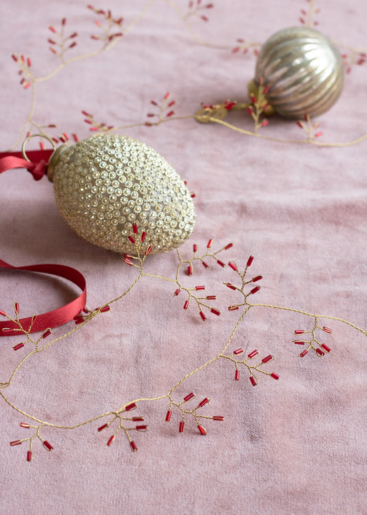 Guirlande de perles rouges