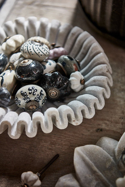 Keramische knop met witte lijn