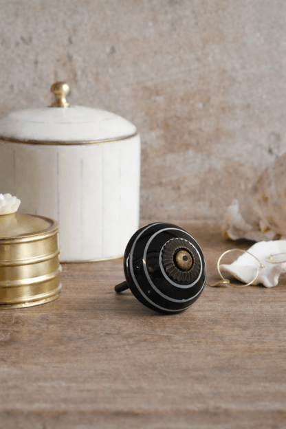 Keramische knop met witte lijn