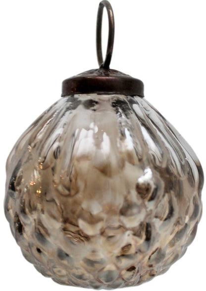 Decorative glass hanging ornament with textured surface on a white background
