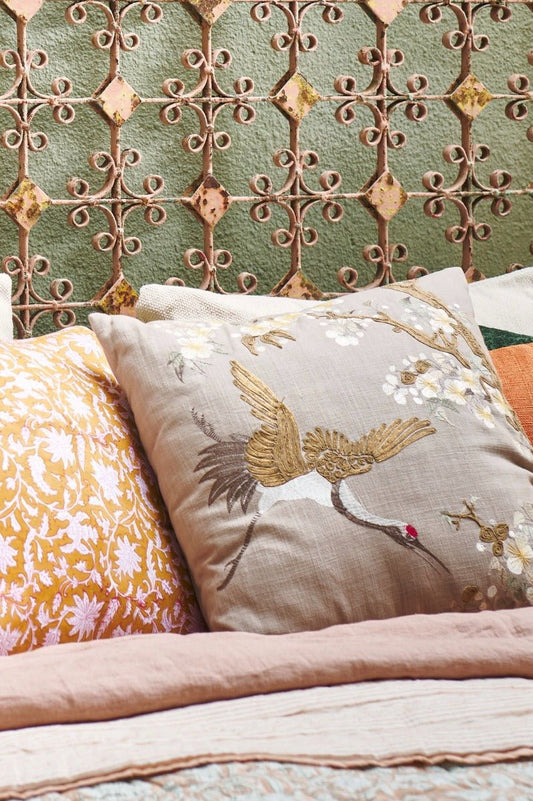 handmade cushion features a beautiful design crafted from cotton greige with embroidery