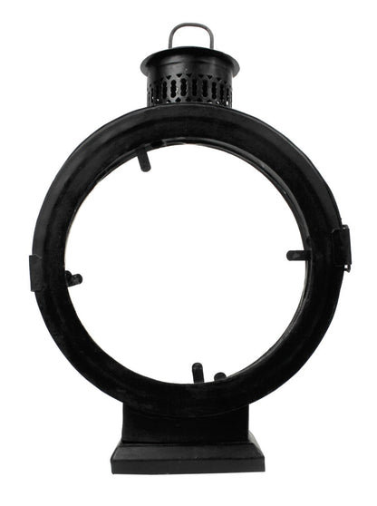 A black metal lantern featuring a circular design, showcasing intricate patterns and a classic aesthetic.