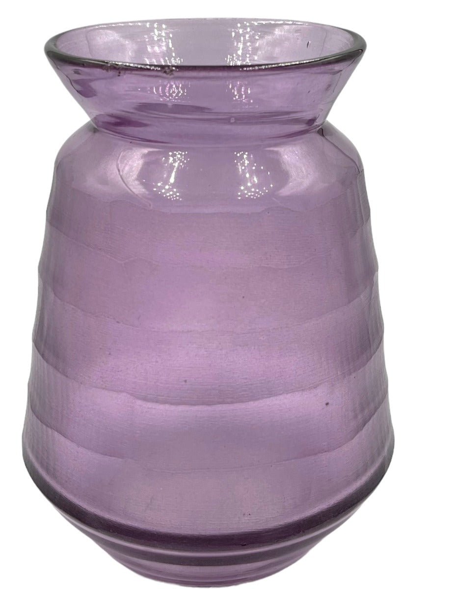 Lilac glass vase with a ribbed texture and flared neck, photographed on a white background.

