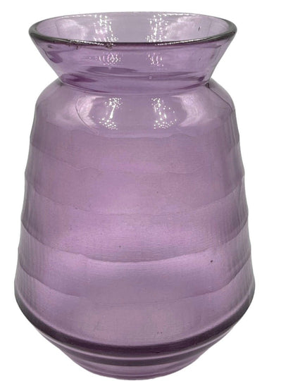 Lilac glass vase with a ribbed texture and flared neck, photographed on a white background.

