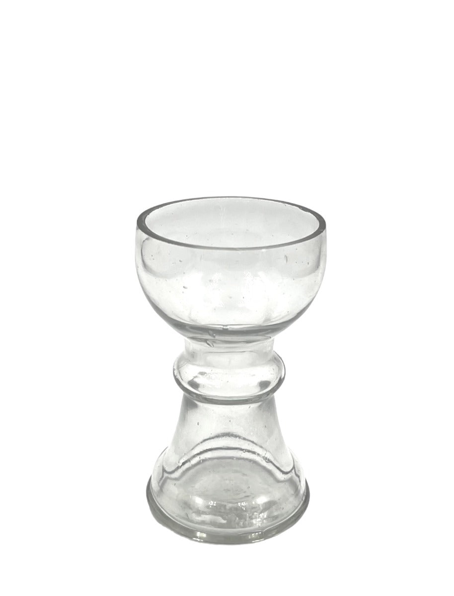 Clear handmade glass vase with rounded bowl top and sculpted base, photographed on a white background.
