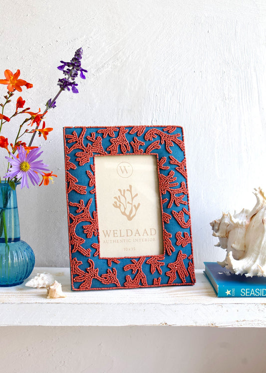 Beaded photo frame in coral design
